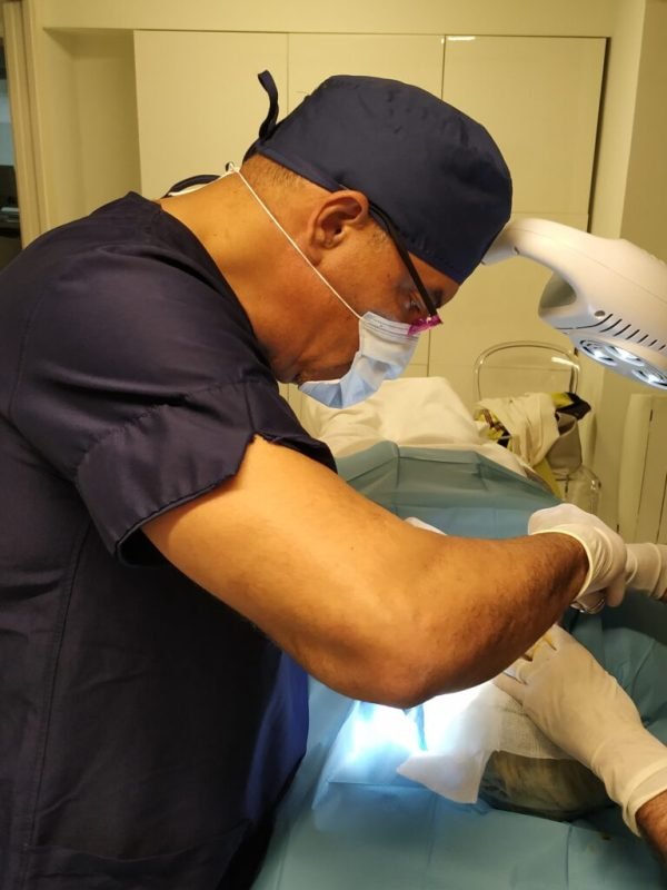 Dr. Eric Licea performing a treatment at the clinic offering vaginal PRP Seychelles patients trust